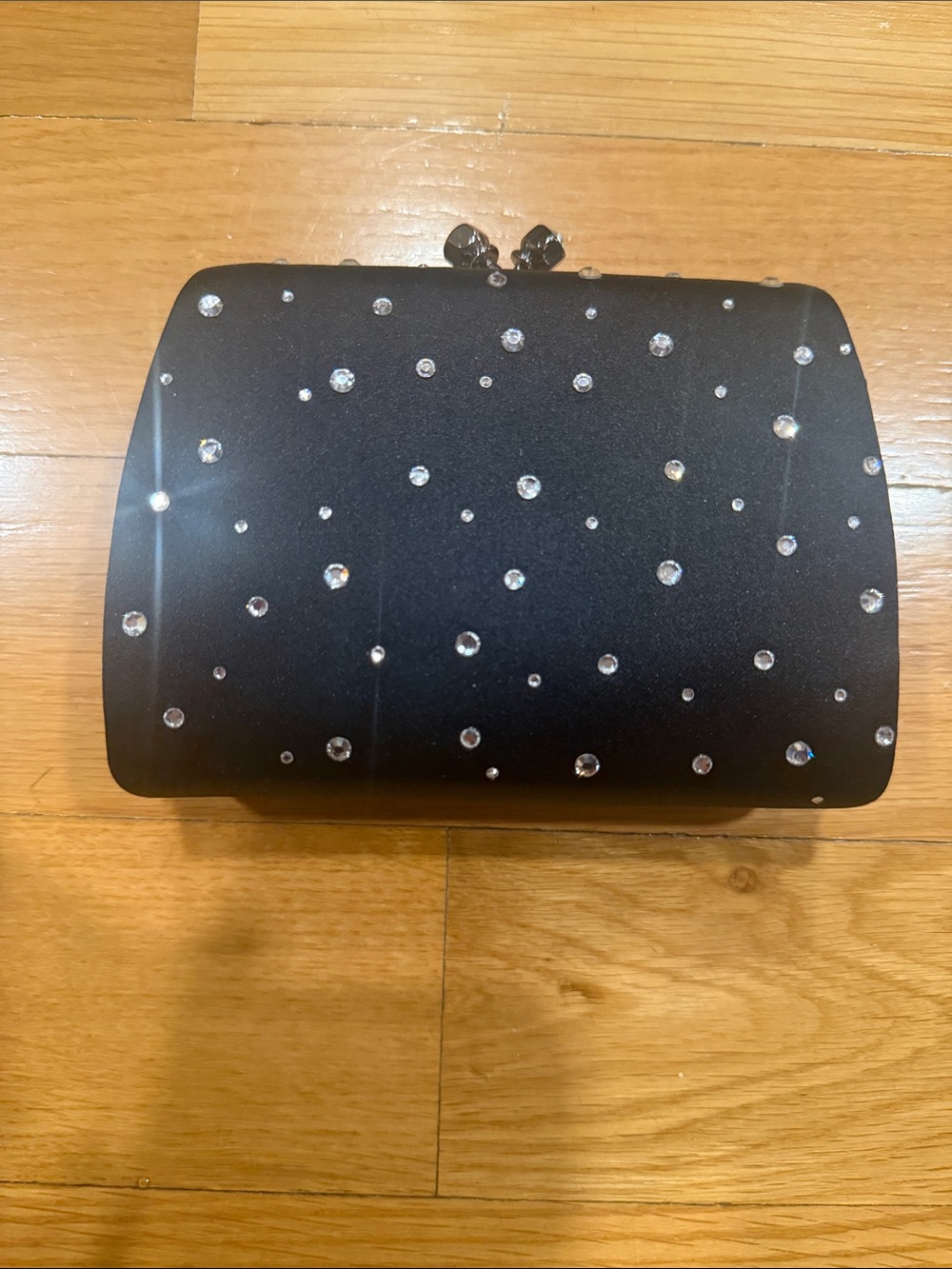 Franchi black with rhinestones little hand bag .